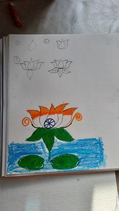 a child's drawing of a flower and leaves on paper with colored crayons