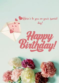 there is a birthday card with flowers and an envelope in the background that says, here's to you on your special day