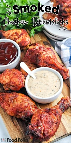 grilled chicken drums with dipping sauce on a cutting board