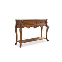 an antique wooden console table with two drawers and one shelf on the bottom, against a white background