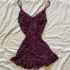 90s Vintage Victoria's Secret Purple Floral Lace V-Neck Slip Dress W/ Ruffle Hem Size: Small Brand: Victoria’s Secret Description: Y2k Purple Sheer Lace Slip Made In March 2003 Deep V Neck Lace Trim Ruffle Pleated Detail On Bottom Trim Padded Cups Low Back Stretchy Spaghetti Straps Adjustable Straps Ruffle Along Bottom Trim Lace Detailing On Cups Size On Model Is A Medium. I Am Selling A Size Small. Photo Is For Reference How It Would Look On. Size In Mannequin Is A Size Extra Small. I Am Sellin Dresses 90s, Lace Babydoll Dress, Purple Lace Dress, Victoria Secret Dress, Burgundy Lace, Lace Slip Dress, Lace Babydoll, Lace Slip, Purple Lace