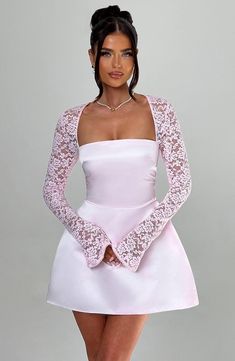 Ultra feminine and alluring, the Sadie mini in Blush is made for romantic dinner dates, garden parties and so much more. Cut from our premium satin fabric, the body of the dress features a square neckline and ultra cinched waist for the silhouette of dreams, contrasted by a voluminous bubble skirt. The look is complete with sheer lace sleeves with flared cuffs.Â 



Colour: Blush.

Premium satin fabric.

Body of dress is fully lined.

Sheer lace sleeves.

Flared cuff to sleeve.

Tie at back shou Luxury Mini Dress With Ruffle Hem And Fitted Bodice, Satin Flared Dresses, Cute Mini Dress With Sleeves, Cute Winter Mini Dress, Wedding Short Dresses Simple, Short And Cute Prom Dresses, Birthday Dress Sleeve, Short Skirt Prom Dresses, A Cut Dresses