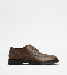 Lace ups in elegant smooth leather with English style wing-tip perforations, stamped monogram and a rubber outsole with embossed rubber pebbles. English Style, Derby Shoes, Smooth Leather, Leather Shoes, Derby, Ups, Leather Upper, Dust Bag, Lace Up