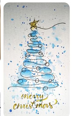 watercolor christmas tree on white paper with blue and gold inks, next to an image of a hand painted christmas tree