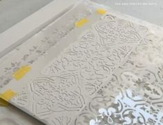 the paper is cut out and ready to be used for decorative wall art work on display