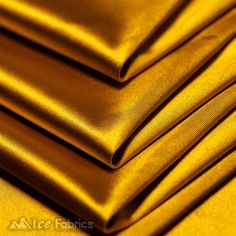 Casino Shiny Gold Spandex 4 Way Stretch Satin Fabric ICE FABRICS Bridesmaid Colours, Wedding September, Stretch Satin Fabric, Satin Pillowcase, Gold Satin, Gold Fabric, Beautiful Drapes, Matte Satin, Thick Fabric