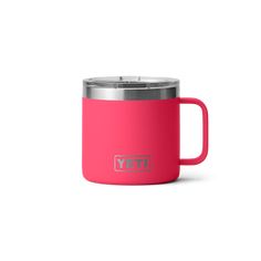 a pink yeti mug with the word yeti on it and a silver lid