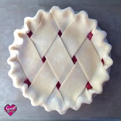 an uncooked pie sitting on top of a pan