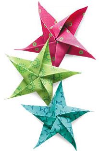 three origami stars in different colors and patterns on a white background, one is pink, one is green