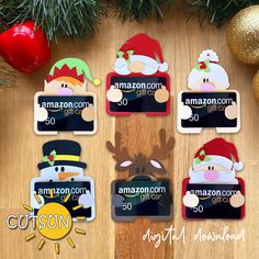 christmas gift tags with santa claus, snowman and reindeer on them next to pine branches