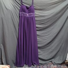 Beautiful Purple Gown. Has A Scarf That Can Be Worn With It. No 1034 Style 8998 Purple Floor-length Maxi Dress With Ruched Bodice, Empire Waist Formal Dress For Prom Season, Purple Sleeveless Maxi Dress For Formal Occasions, Prom Season Empire Waist Evening Dress, Formal Empire Waist Maxi Dress For Prom Season, Formal Sleeveless Purple Maxi Dress, Formal Prom Season Maxi Dress With Empire Waist, Formal Empire Waist Maxi Dress For Prom, Purple Maxi-length Formal Dress