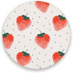 a white plate with strawberries on it