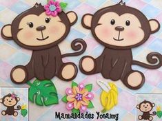 two monkeys with flowers on their heads