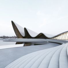 an architectural building with wavy lines and curves