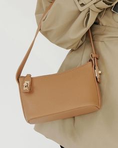 Turn heads with our Tan Twister Hobo Bag. Crafted from the finest Togo leather and featuring chic golden details, it’s perfect for your everyday carry and wear. Small but incredibly functional✨ Brand Bags, Everyday Carry, Branded Bags, Carry On, Card Holder, Turn Ons