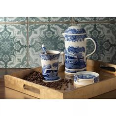 a blue and white coffee set on a tray