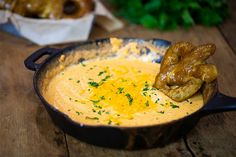 a close up of food in a pan on a table