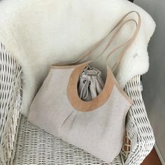 A comfortable and capacious boho/shoulder bag made of canva. Inside of the bag is sack-like, what you can close with help of strings. Casual Beige Tote Shoulder Bag, Beige Tote Shoulder Bag For Vacation, Eco-friendly Shoulder Bag With Rolled Handles For Travel, Casual Beige Tote Satchel, Casual Beige Canvas Satchel Bag, Casual Canvas Bag With Rolled Handles For Travel, Summer Beige Tote Shoulder Bag, Beige Hobo Bag With Large Capacity For Summer, Bohemian Beige Beach Bag With Large Capacity