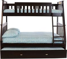 a bunk bed with blue and white bedspread on it's bottom shelf