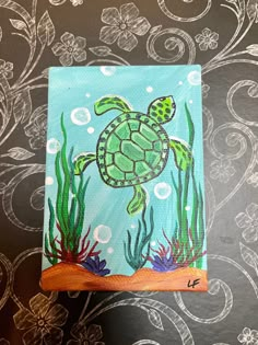 a painting of a turtle swimming in the ocean