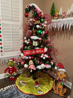 a christmas tree decorated with candy and lollipops