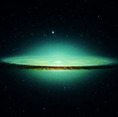 an image of a very large green object in the dark sky with stars around it