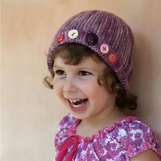 An adorable cloche hat that is knit sideways. Raid your button stash for a unique decoration!\r\n\r\nSizes fit babies to adults.\r\n\r\nSkills required:\r\n Knit & purl sts, short rows, provisional cast-on, Kitchener stitch\r\n\r\nGauge \r\n 23 sts x 30 rows to 4in/10 Hat Knit Pattern, Cloche Hat Pattern, Beanie Knitting Patterns Free, Kids Knitting Patterns, Vintage Style Hat, Hat Knitting Pattern, Wooly Hats, Beginner Knitting Patterns, Hat Knit