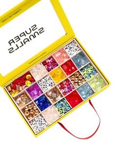 the box contains many different types of beads