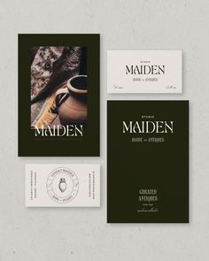 an assortment of business cards and envelopes designed to look like old books with the title maiden written on them