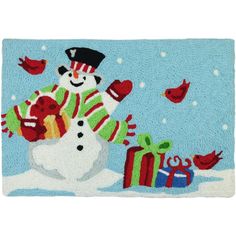 a door mat with a snowman holding presents and birds flying around it on a snowy day