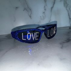 Love Crystal Sunglasses, Mirror lens Wrap Around Space Style, Hand Covered with High Quality, Brilliant Sparkling Crystals. Personalized with the word LOVE on each lens in silver clear diamond crystals.  These on trend, italian style sunglasses come in many color options. Pleases see listing picture and variations at check out to select the color of your choice. Further personalization:  I can personalize the lens with initials, frat or sorority names, numbers, symbols or short words. Message me Rave Fit, Bling Sunglasses, Sorority Names, Sunglasses Mirror, Numbers Symbols, Crystal Sunglasses, Space Style, Unique Gift Items, Style Sunglasses