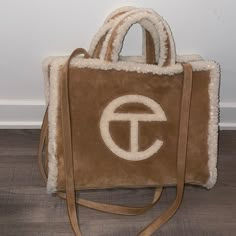 ***Last Listing Was Not Sold**** Hey Y’all, I Ordered This Bag During Christmas Last Year And I Don’t Use It At All (3 Times). It’s Authentic, I Just Don’t Like The Brand As Much. Ask Any Questions You Need, I’m Just Selling Because I Don’t Use It. I Paid The Original Price $290, So I Just Want Money Back. Listing Price Is Based On Poshmark’s Charges And In Order For Me To Get Full Refund. Telfar Ugg, Telfar X Ugg, Telfar Shopping Bag, Telfar Bags, Ugg Bag, Telfar Bag, Western Outfits Men, Boat Tote, Luxury Bags Collection