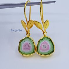 Thank you for coming in!  Spectacular 18K solid yellow gold earrings with a matching pair of 11mmx12mm large watermelon tourmaline slices!  Rare one-of-a-kind earrings for a family heirloom! You'll get the pair of earrings  you see! WEIGHT: 22.10 carats DIMENSION: 1.42 Inch Total Length. Tourmaline Appr. 11mmx12mm.  MATERIAL: 18K Solid Yellow Gold,  Watermelon Tourmaline Slices Watermelon Tourmaline, Yellow Gold Earring, Family Heirloom, Intense Colors, Pink Tourmaline, Accent Pieces, Tourmaline, Watermelon, Solid Gold