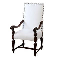 Inspired by traditional Spanish Colonial furniture, the Mayorca Spanish Armchair brings the splendor of that era to life. Hand-crafted with carefully carved details and a rich, dark maple finish, this chair exemplifies meticulous attention to detail. The generous size offers a truly comfortable seating experience. Made from solid hardwood Shown in a rich maple finish Shown in Reba White Fabric Choice of wood finishes and fabrics Spanish Dining Chairs, Spanish Mission Style, Style Categories, Shabby Chic Coastal, Mission Style Furniture, Spanish Mission, French Country Shabby Chic, Spanish Villa, Colonial Furniture