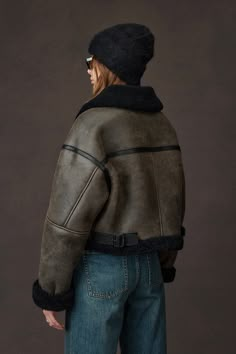 Retro Edge Meets Modern Chic: Shearling-Lined Biker Style ( Pre-sale - Expected to ship out within 7-10 days ) Dive into the vintage charm with our Distressed Shearling Collar Cropped Sheepskin Biker Jacket. A classic autumn staple, this jacket combines the rugged texture of a motorcycle jacket with the luxurious warmth of shearling. Despite its substantial feel, it's surprisingly lightweight and not cumbersome, ensuring both warmth and a sense of security. The custom-aged leather surface create Shearling Jacket Outfit, Autumn Jacket, Outfit Retro, Fox Fur Jacket, Biker Outfit, Stylish Winter Outfits, Retro Motorcycle, Fur Jackets, Winter Fits