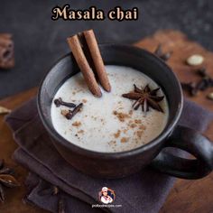 masala chai in a mug with cinnamon sticks