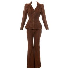 Christian Dior by John Galliano brown tooled and laser cut leather flared pant suit. Spring-Summer 2006 Brown Suit Women's, 2006 Style, Dior Pants, Women's Pant Suits, 70s Pants, Dior By John Galliano, Dior Clothing, Dior Monogram, Trending 2023