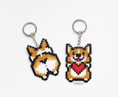 two key chains with different designs on them