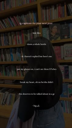 the back of a person's head in front of a bookshelf filled with books