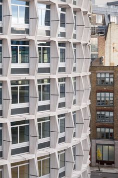 Squire and Partners unveils renovation of brutalist offices in London