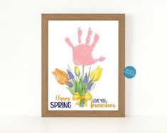 a card with a handprint and flowers on it that says, happy spring love you bunches