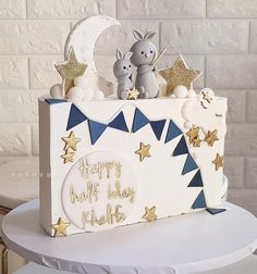 a birthday cake decorated with stars and bunting