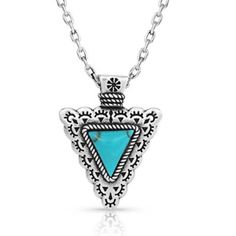 Wear a symbol of strength and stability with the Established Strength Turquoise Necklace. In the center of the pendant is a bright triangle shaped turquoise stone adding a pop of color to the design. Surrounding the center stone is an etched Southwest design elevating the necklace and making a perfect accessory to elevate any look. Secured by an 18 inch silver tone chain this necklace will be a stunning addition to your collection. Stone color will vary. Montana Armor protective coating Turquoise Triangle Jewelry For Gifts, Turquoise Triangle Jewelry Gift, Silver Multi-stone Turquoise Necklace As A Gift, Western Style Nickel-free Turquoise Necklace, Southwestern Sterling Silver Multi-stone Necklace, Southwestern Style Blue Turquoise Nickel-free Necklace, Western-style Sterling Silver Turquoise Pendant Necklace, Southwest Design, Western Jewelry