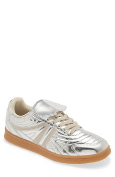 Streamlined and shiny, this sneaker features a low, speedy profile and a flap that folds protectively over the laces. Lace-up style Synthetic and textile upper/synthetic lining/rubber sole Imported Leather Lace-up Sneakers With Reflective Details, Metallic Round Toe Sneakers For Sports, Metallic Low-top Sneakers For Sports, Metallic Sneakers For Sports, Modern Metallic Round Toe Sneakers, Silver Lace-up High-top Sneakers, Metallic Low-top Synthetic Sneakers, Metallic Lace-up Sneakers For Sports, Metallic Lace-up Sports Sneakers