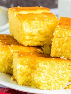 several pieces of cornbread on a white plate