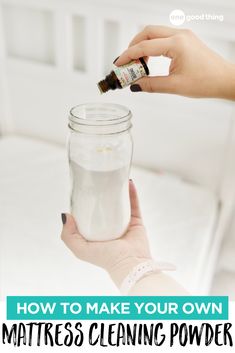 a person is holding a jar with some white stuff in it