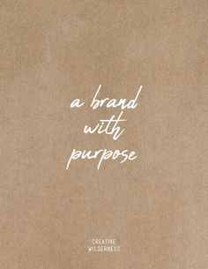 a brown book with white writing on the front and back cover that says, a brand with purpose