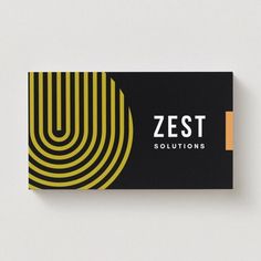 a black and yellow business card with the zest logo on it's front