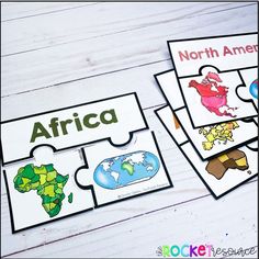 four puzzles with different countries on them and the words africa written in each puzzle piece