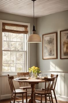 Cozy dining area with wooden table and chairs, sunlight streaming through the window, vase of yellow flowers on the table. Narrow Long Dining Room, Dining Room Comfy, Formal Room Decor, Dining Room Inspiration Paint, Modern Traditional Breakfast Area, Dining Room Design Cottage, Small Dining Room Decor Cozy, Small Cozy Dining Area, Kitchen Dining Wall Decor